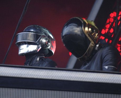 Daft Punk performing live on stage