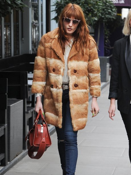 Florence Welch wearing a fur coat