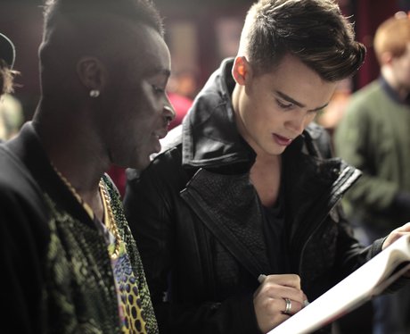 Union J's Josh signing an autograph