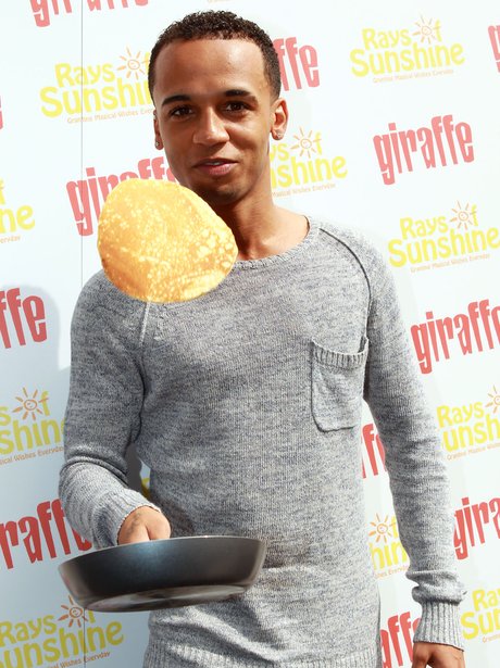 Aston Merrygold tossing a pancake