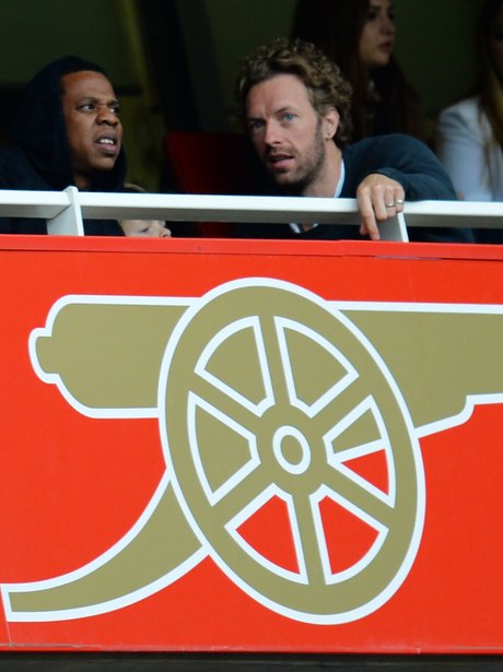 Jay-Z and Chris Marting watching football