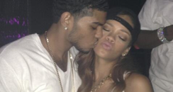 Rihanna kissing a fan