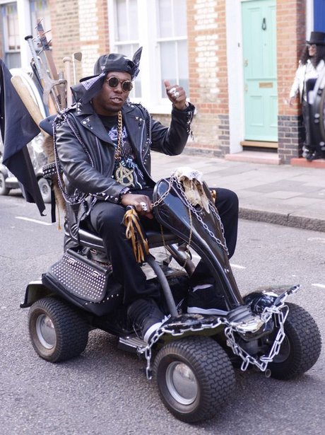 Dizzee Rascal on a mobility scooter