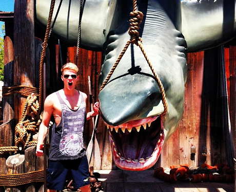 Lawson's Ryan Fletcher next to a shark