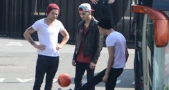 One Direction playing football