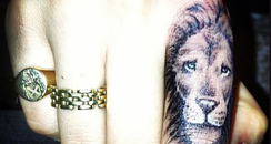 Cara Delevingne lion tattoo