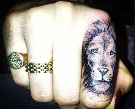 Cara Delevingne lion tattoo