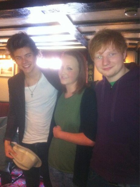Ed Sheeran and Harry Styles with a fan
