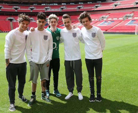 One Direction wearing the England football kit