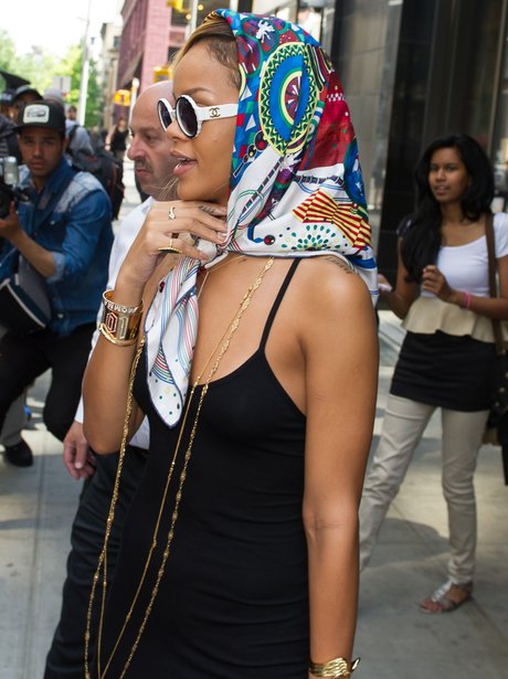Rihanna wearing a head scalf