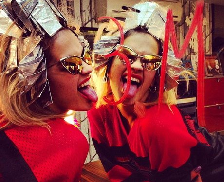 Rita Ora having her hair highlighted