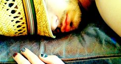Zayn Malik asleep with painted nails