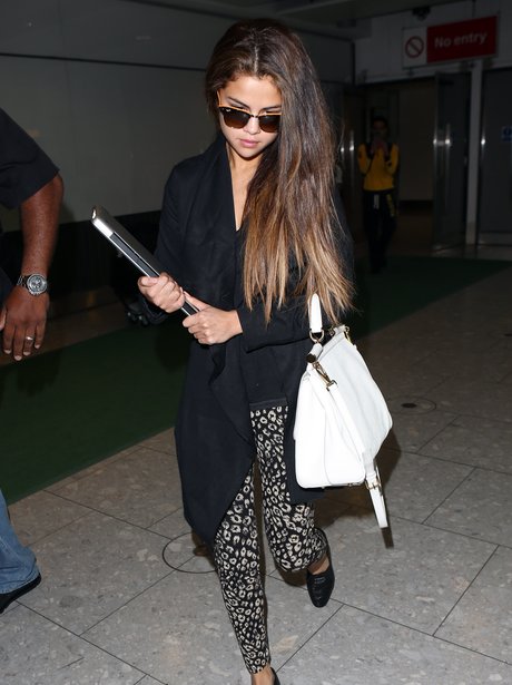 Selena Gomez wearing print trousers