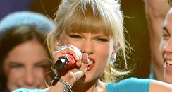 Taylor Swift performs onstage during the 2013 Bill