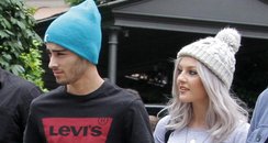 Zayn Malik and Perrie Edwards holding hands