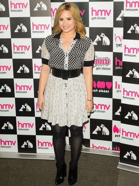 Demi Lovato attends alnum signing