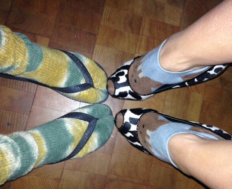Katy Perry wearing flip flops and socks