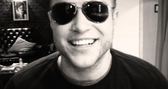 Olly Murs wearing glasses