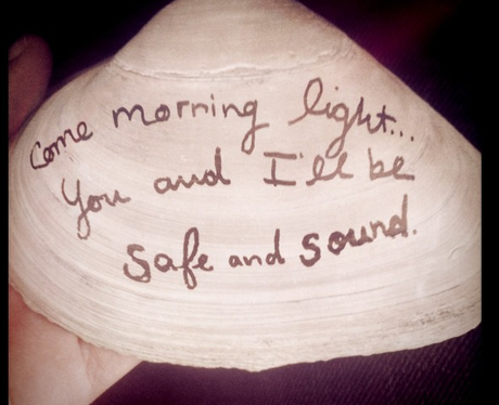 Taylor Swift writes lyrics on a sea shell
