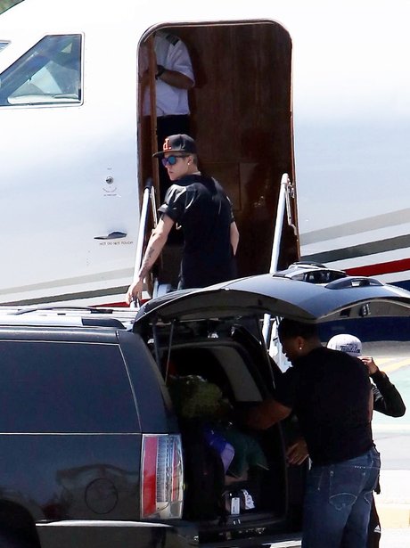 Justin Bieber getting on a plane