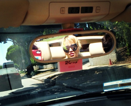 Rita Ora in a car