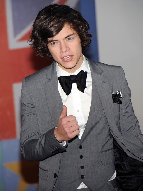 Harry Styles wearing a suit