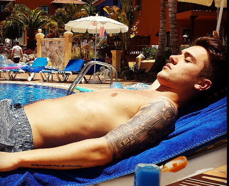 JJ from Union J sunbathing