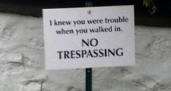Taylor Swift No Trespassing' sign post