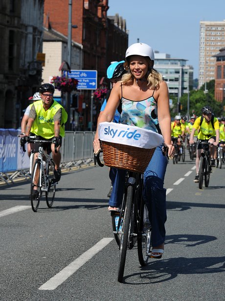 Kimberley Walsh riding a bicycle