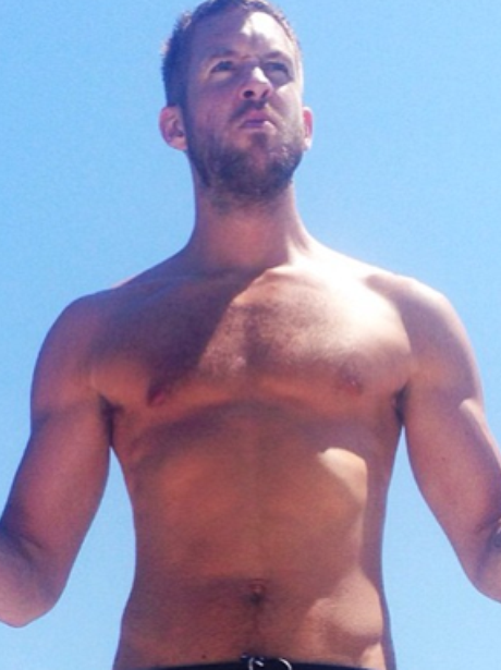 Calvin Harris poses topless