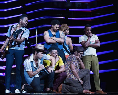 Bruno and his band take a moment to check out something happening in the front row  Capital
