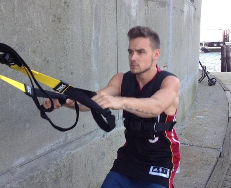 Liam Payne pulls some cable rows for a workout