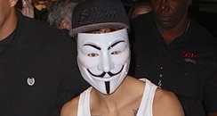 Justin Bieber wearing a mask