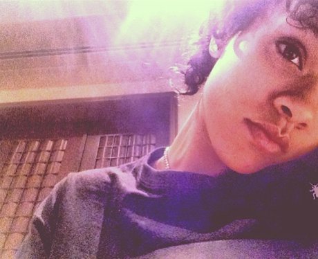 Rihanna with new curly hair