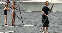 Taylor Swift and Ed Sheeran paddle boarding
