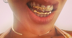 Rihanna wearing teeth grilz