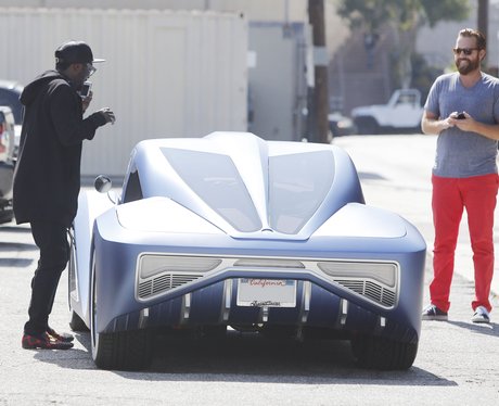 Will.i.am by his car