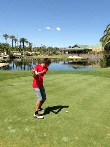 Tom Parker playing golf