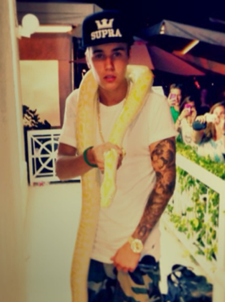 Justin Bieber with a snake