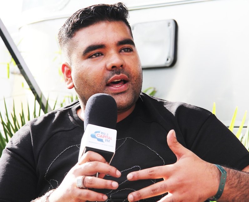 Naughty Boy during his Capital FM radio interview backstage at Fusion Festival 2013