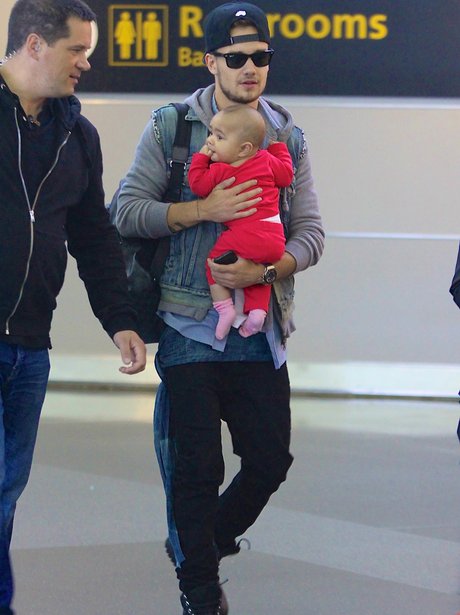 Lady Payne holding a baby