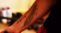 Liam Payne Feather Tattoo