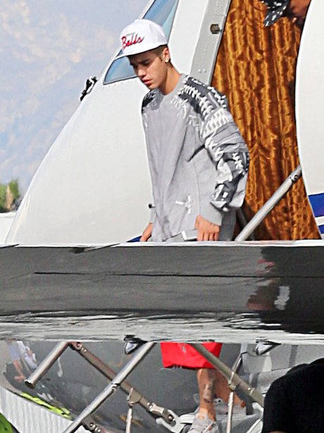 Justin Bieber getting off his private jet