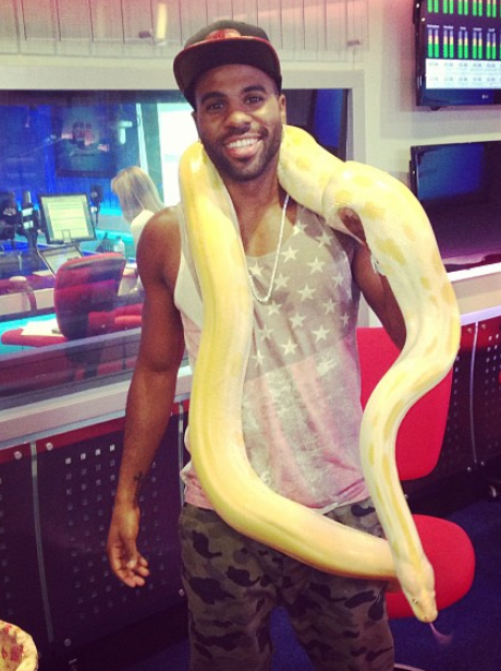Jason Derulo with a snake