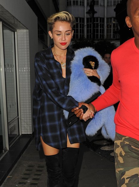 Miley Cyrus leaving her hotel in London