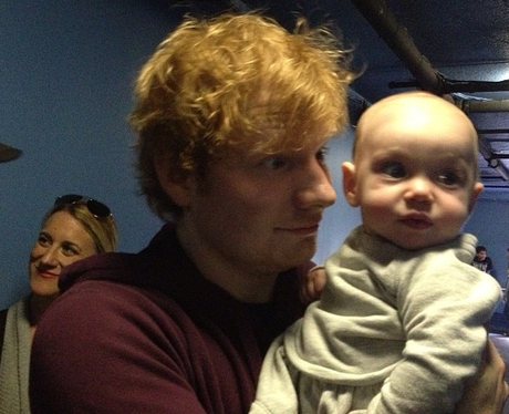 Ed Sheeran with a baby