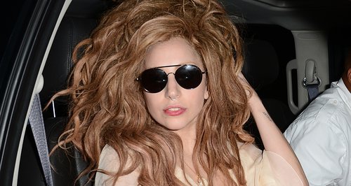 Lady Gaga leaving a restaurant with messy hair