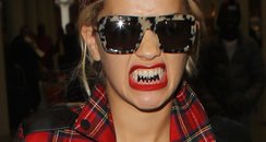 Rita Ora wearing teeth grilz