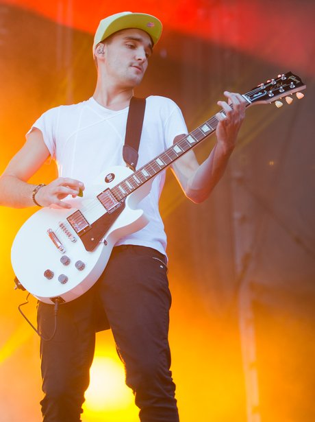 To Parker playing the guitar