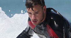 Liam Payne surfing